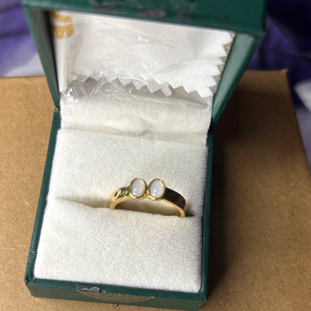 Elegant Gold and White Stone Ring